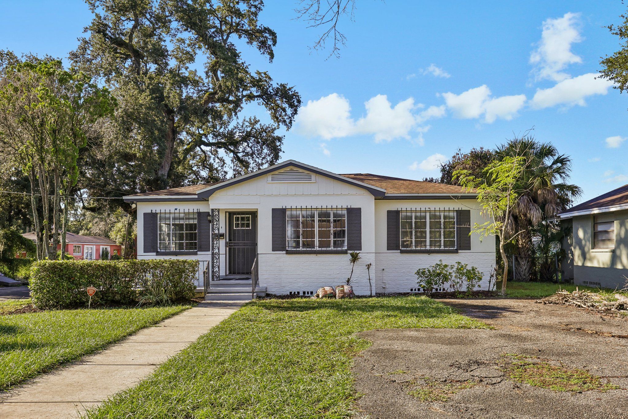 Renovated single-family home at 2217 Mallory Ave with new paint and landscaping