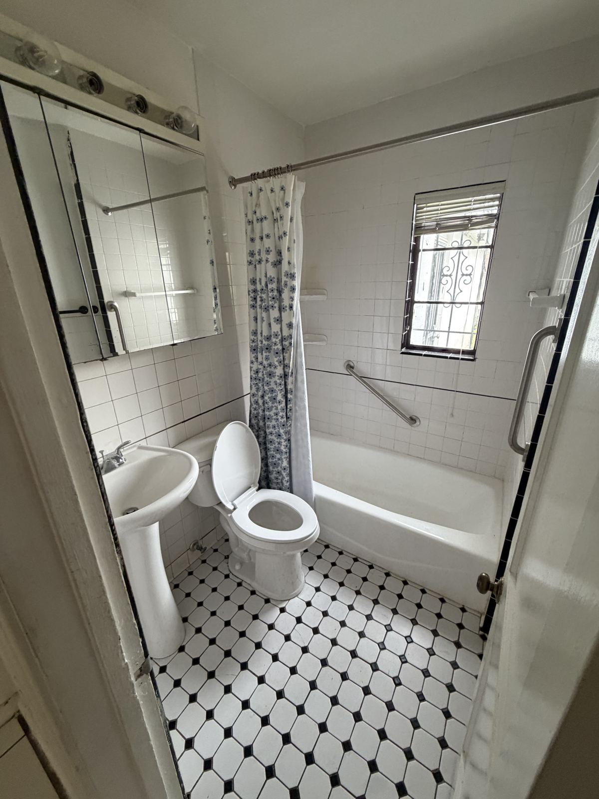 Before: dated hall bath